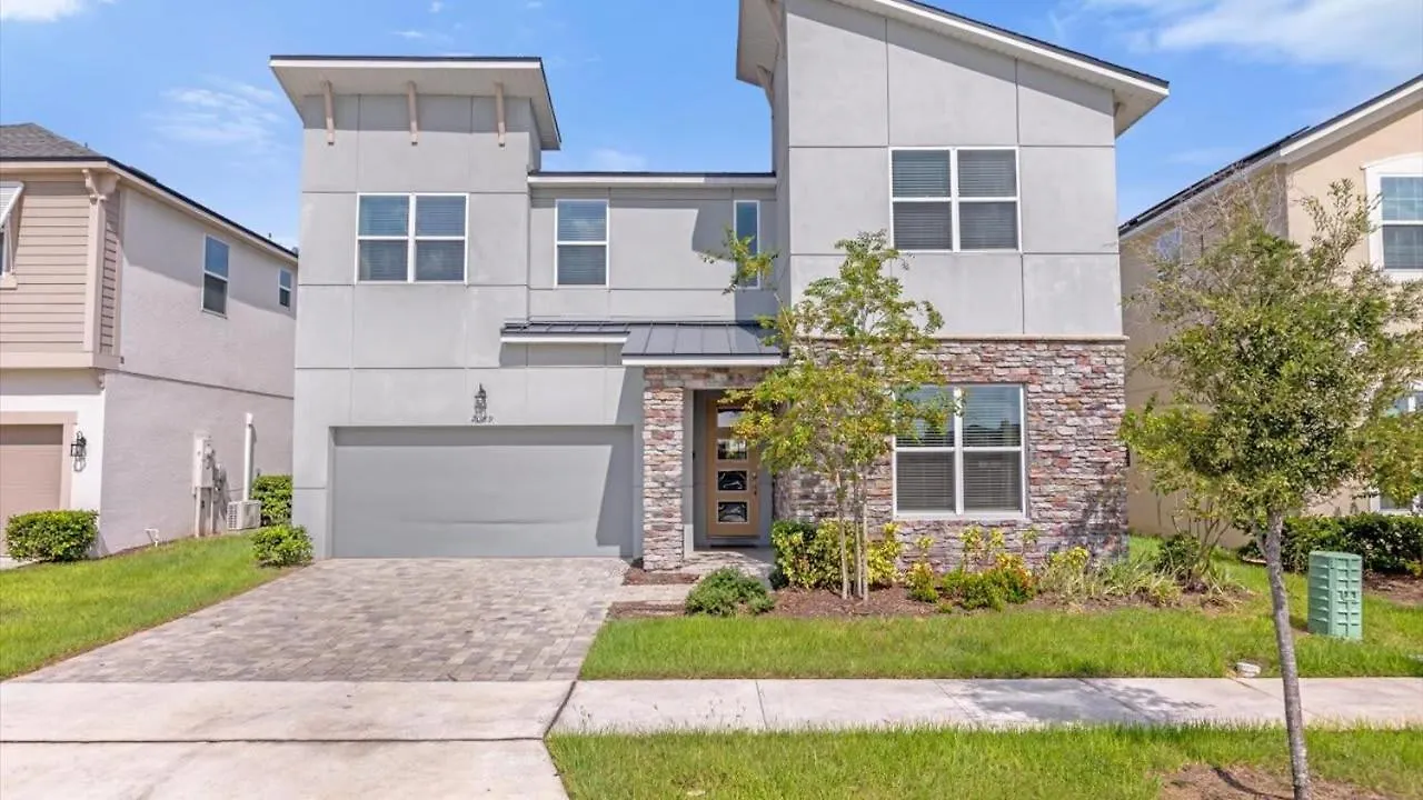 Majestic 9-bedroom Home: Luxury & Serenity Await Kissimmee